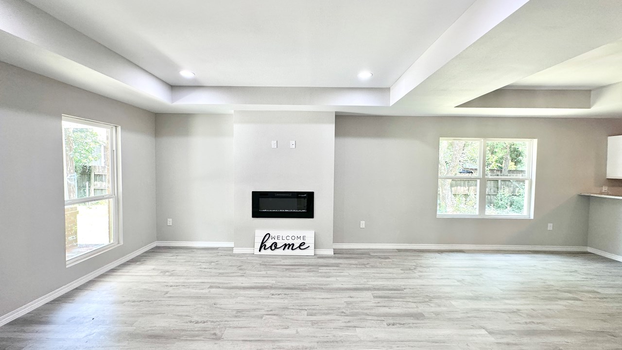family room overlooking dining area and kitchen